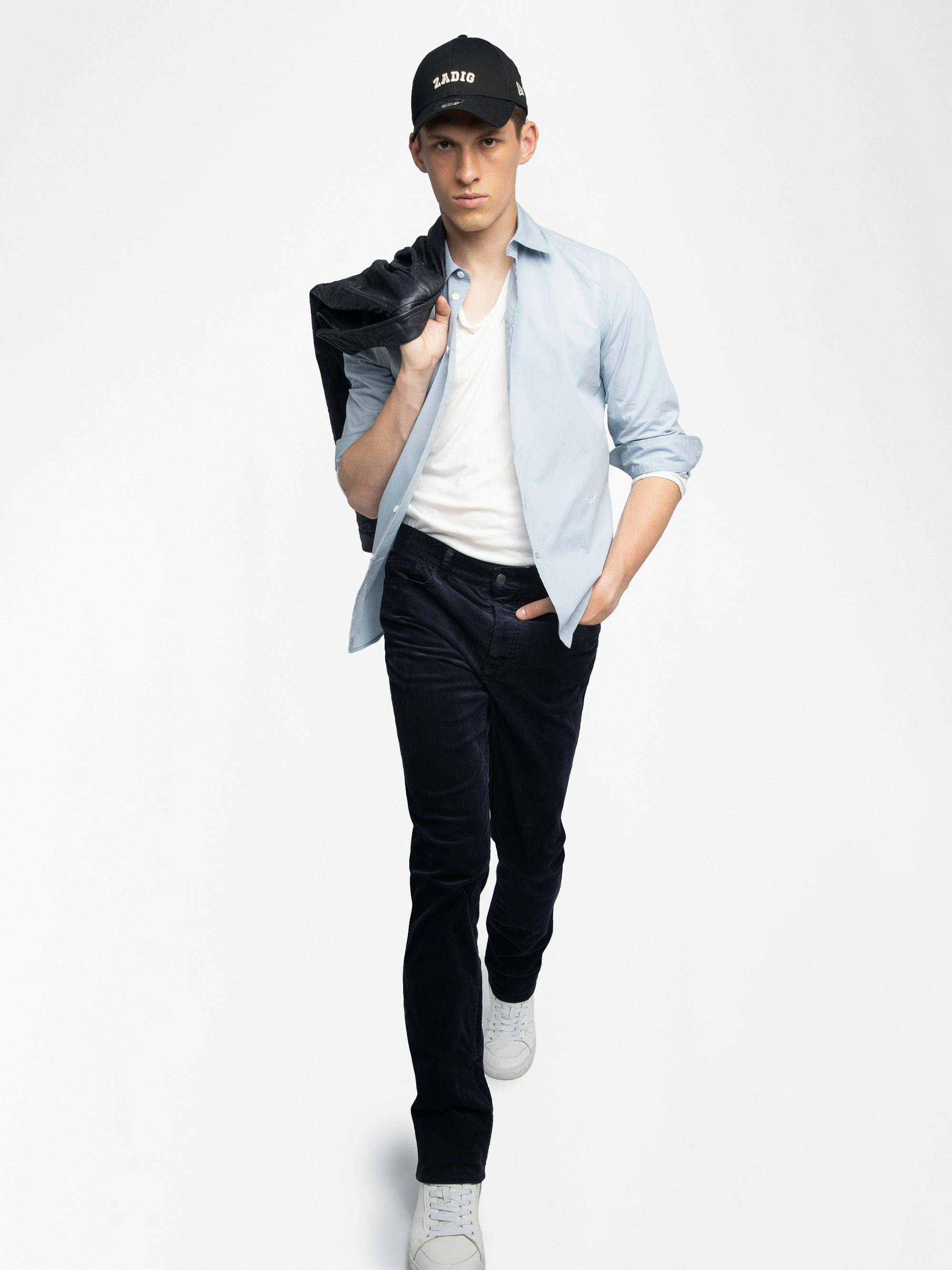 Steeve Corduroy Trousers - Corduroy trousers with button opening.